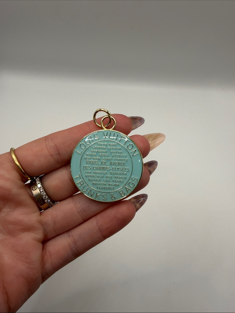 1492. Turquoise Enamel & Gold Trunks & Bags Round Charm